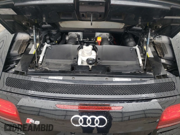 2014 Audi R8 z VIN WUASUAFG4EN001365, wystawiony jako Copart lot #58440864 z przebiegiem 67 980 mil mil oraz Szkoda całkowita • Salvage title. Historia ofert i sprzedaży dostępna na DreamBid. Obrazek 12.
