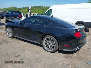 2021 Ford Mustang GT z VIN 1FA6P8CFXM5156002, wystawiony jako IAAI lot #42009222 z przebiegiem 65 939 mil mil oraz . Historia ofert i sprzedaży dostępna na DreamBid. Obrazek 3.