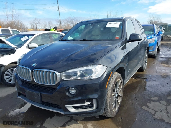 2018 BMW X5 xDrive40e iPerformance with VIN 5UXKT0C52J0W02406, listed as a IAAI auction lot 41449943 with 74,215 mi miles. Bid and sale history available at carsss.com. Image 18.
