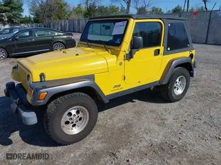 2004 Jeep Wrangler X with VIN 1J4FA39S84P800291, listed as a IAAI auction lot 41975648 with 205,402 mi miles. Bid and sale history available at carsss.com. Image 17.