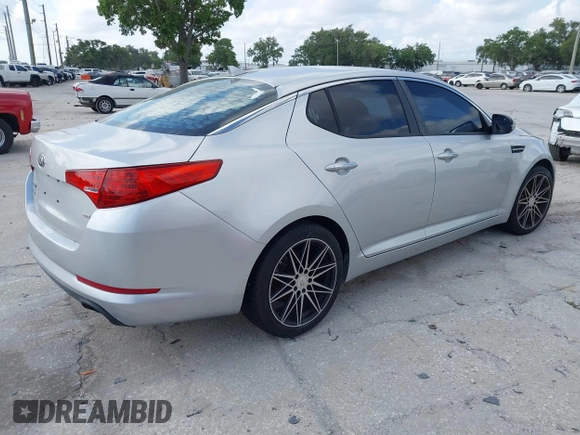 2013 Kia Optima LX with VIN KNAGM4A75D5380478, listed as a IAAI auction lot 42153829 with 82,845 mi miles. Bid and sale history available at carsss.com. Image 4.