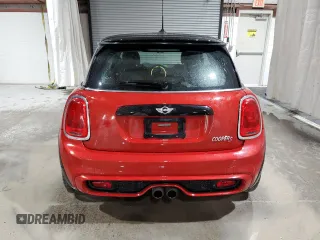 2015 MINI Hardtop S z VIN WMWXP7C51F2A58240, wystawiony jako Copart lot #58467225 z przebiegiem 101 775 mil mil oraz Szkody całkowita. Historia ofert i sprzedaży dostępna na DreamBid. Obrazek 6.