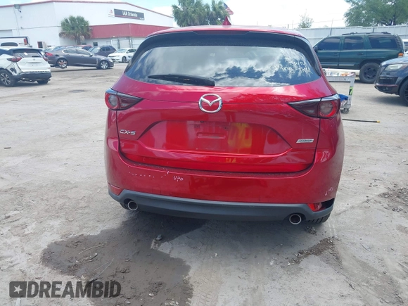 2019 Mazda CX-5 Touring with VIN JM3KFACM6K1549234, listed as a IAAI auction lot 42036633 with 85,065 mi miles and . Bid and sale history available at carsss.com. Image 17.