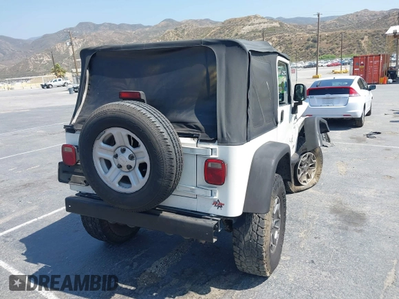 2003 Jeep Wrangler X with VIN 1J4FA39S73P321181, listed as a IAAI auction lot 42462732 with 170,460 mi miles and . Bid and sale history available at DreamBid. Image 4.