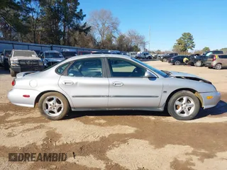 1999 Ford Taurus SE with VIN 1FAFP53S6XA322930, listed as a IAAI auction lot 41422655 with 189,696 mi miles. Bid and sale history available at carsss.com. Image 13.
