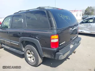 2003 Chevrolet Tahoe Z71 with VIN 1GNEK13Z13R166468, listed as a IAAI auction lot 41848131 with 163,738 mi miles. Bid and sale history available at carsss.com. Image 3.
