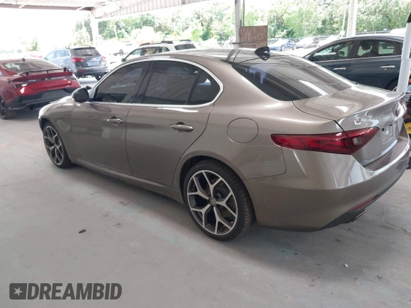 2019 Alfa Romeo Giulia Ti Sport with VIN ZARFAMBN1K7599269, listed as a IAAI auction lot 42271523 with 46,556 mi miles and . Bid and sale history available at DreamBid. Image 3.