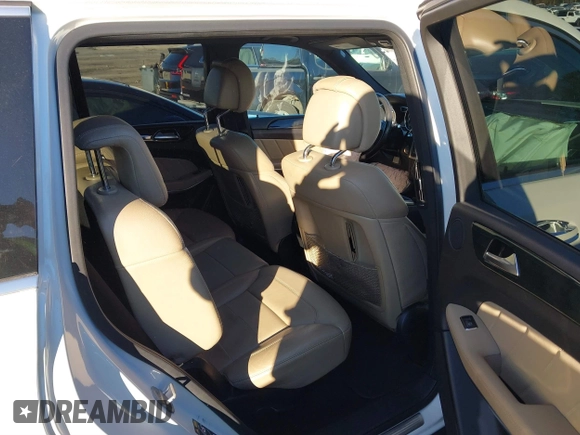 2016 Mercedes-Benz GL with VIN 4JGDF7DE6GA703049, listed as a IAAI auction lot 41063570 with 116,736 mi miles. Bid and sale history available at carsss.com. Image 8.