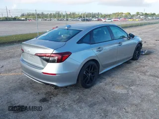 2025 Honda Civic Sport z VIN 2HGFE2F57SH519010, wystawiony jako IAAI lot #41934874 z przebiegiem 7999 mil mil oraz . Historia ofert i sprzedaży dostępna na DreamBid. Obrazek 4.