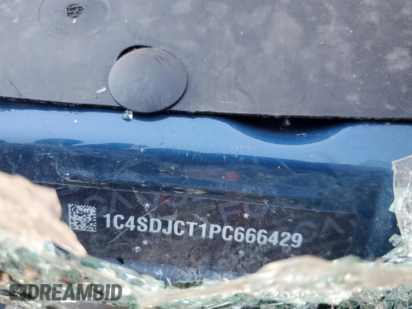 2023 Dodge Durango R/T Plus z VIN 1C4SDJCT1PC666429, wystawiony jako Copart lot #52094455 z przebiegiem Nie podano mil oraz Nie do naprawy • Non repairable. Historia ofert i sprzedaży dostępna na DreamBid. Obrazek 13.