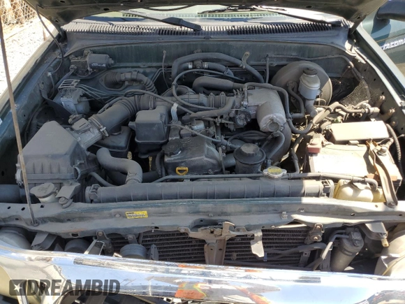 2003 Toyota Tacoma with VIN 5TENL42N73Z234668, listed as a Copart auction lot 55064555 with 164,832 mi miles and Salvage Title. Bid and sale history available at DreamBid. Image 11.