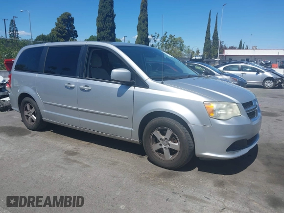 2012 Dodge Grand Caravan SXT with VIN 2C4RDGCG7CR204835, listed as a IAAI auction lot 41948688 with 125,466 mi miles and . Bid and sale history available at DreamBid. Image 1.