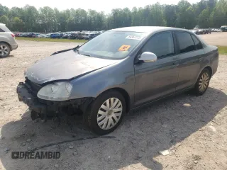 2010 Volkswagen Jetta S with VIN 3VWJX7AJXAM002625, listed as a Copart auction lot 54357775 with 187,410 mi miles and Salvage title. Bid and sale history available at DreamBid. Image 1.