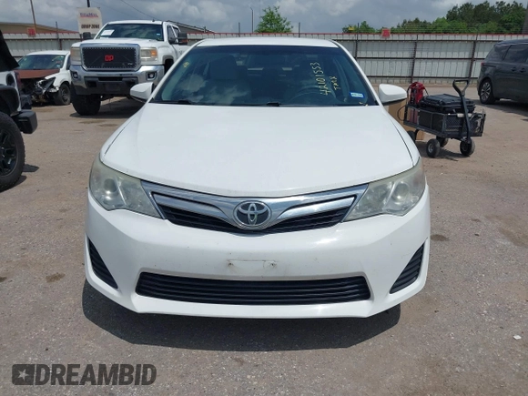 2014 Toyota Camry L with VIN 4T4BF1FK2ER375590, listed as a IAAI auction lot 42101553 with 126,849 mi miles and . Bid and sale history available at DreamBid. Image 12.