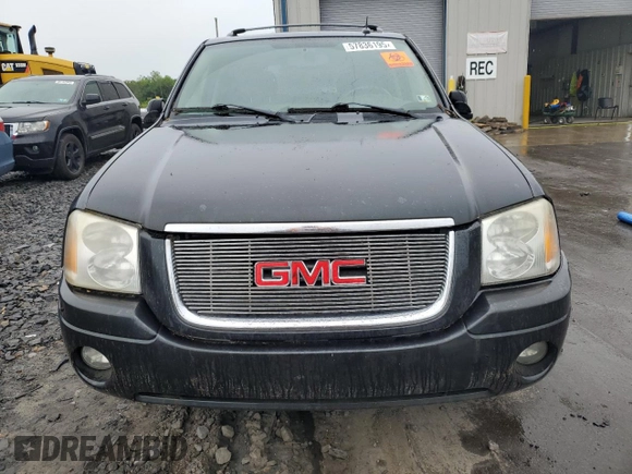 2005 GMC Envoy SLT with VIN 1GKDT13S452324077, listed as a Copart auction lot 57836195 with 299,146 mi miles and Clean title. Bid and sale history available at DreamBid. Image 5.