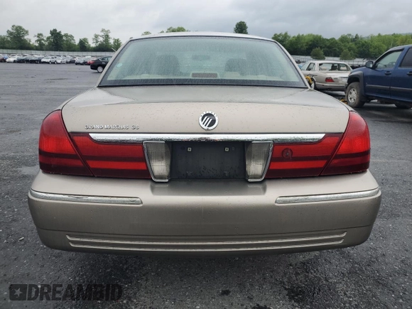 2004 Mercury Grand Marquis GS z VIN 2MEFM74W84X692469, wystawiony jako Copart lot #57794475 z przebiegiem 68 439 mil mil oraz Szkoda całkowita • Salvage title. Historia ofert i sprzedaży dostępna na DreamBid. Obrazek 6.