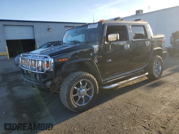 2005 Hummer H2 SUT z VIN 5GRGN22U15H101289, wystawiony jako Copart lot #84107974 z przebiegiem Nie podano mil oraz Szkody całkowita. Historia ofert i sprzedaży dostępna na DreamBid. Obrazek 1.