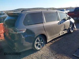 2014 Toyota Sienna SE with VIN 5TDXK3DC1ES462473, listed as a IAAI auction lot 41811437 with 209,704 mi miles and . Bid and sale history available at DreamBid. Image 4.