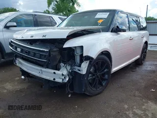 2018 Ford Flex SEL z VIN 2FMGK5C81JBA13004, wystawiony jako IAAI lot #42219904 z przebiegiem 107 723 mil mil oraz . Historia ofert i sprzedaży dostępna na DreamBid. Obrazek 2.