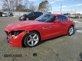 2014 BMW Z4 sDrive28i with VIN WBALL5C57EP556519, listed as a Copart auction lot 88090055 with 124,767 mi miles and Salvage Title. Bid and sale history available at carsss.com. Image 1.