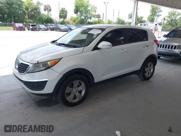 2013 Kia Sportage LX z VIN KNDPB3A2XD7521010, wystawiony jako IAAI lot #42297975 z przebiegiem 134 826 mil mil oraz . Historia ofert i sprzedaży dostępna na DreamBid. Obrazek 18.