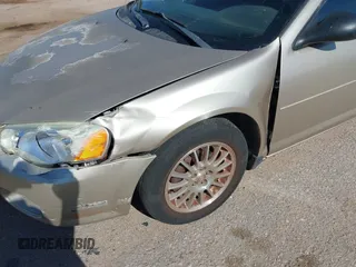 2006 Chrysler Sebring z VIN 1C3EL46XX6N146558, wystawiony jako IAAI lot #42433120 z przebiegiem 123 781 mil mil oraz . Historia ofert i sprzedaży dostępna na DreamBid. Obrazek 6.