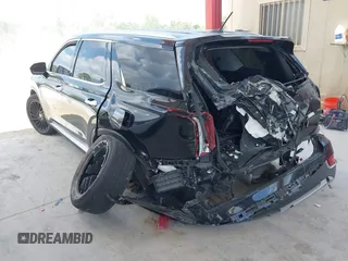 2021 Hyundai Palisade SEL z VIN KM8R34HE5MU202798, wystawiony jako IAAI lot #42339654 z przebiegiem 104 689 mil mil oraz . Historia ofert i sprzedaży dostępna na DreamBid. Obrazek 3.