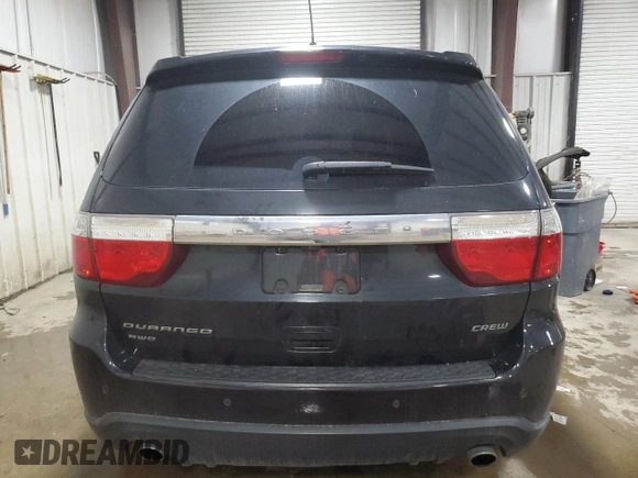 2013 Dodge Durango Crew with VIN 1C4SDJDT8DC509541, listed as a Copart auction lot 54063395 with 145,471 mi miles and Salvage title. Bid and sale history available at DreamBid. Image 6.