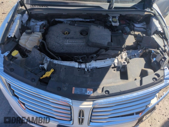 2015 Lincoln MKC z VIN 5LMTJ2AH7FUJ26375, wystawiony jako Copart lot #57830425 z przebiegiem 96 169 mil mil oraz Szkoda całkowita • Salvage title. Historia ofert i sprzedaży dostępna na DreamBid. Obrazek 12.