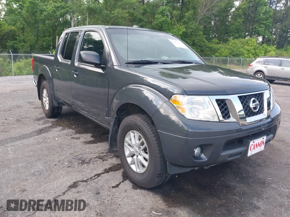 2015 Nissan Frontier SV with VIN 1N6AD0EV6FN751948, listed as a IAAI auction lot 42063935 with 52,244 mi miles and . Bid and sale history available at DreamBid. Image 1.