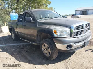 2007 Dodge Ram 1500 SLT with VIN 1D7HU18P37S239450, listed as a IAAI auction lot 40520938 with 211,609 mi miles. Bid and sale history available at carsss.com. Image 1.