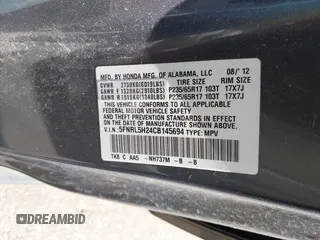2012 Honda Odyssey LX with VIN 5FNRL5H24CB145694, listed as a IAAI auction lot 41902821 with 134,402 mi miles and . Bid and sale history available at carsss.com. Image 9.