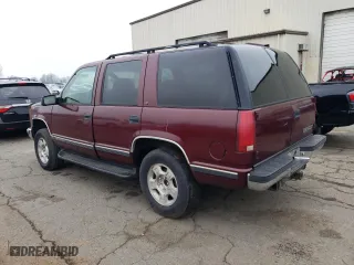 1999 Chevrolet Tahoe Z71 with VIN 1GNEK13R8XJ530020, listed as a Copart auction lot 46325435 with 409,412 mi miles and Salvage Title. Bid and sale history available at carsss.com. Image 2.