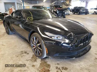 2017 Aston Martin DB11 z VIN SCFRMFAV9HGL02951, wystawiony jako Copart lot #53633992 z przebiegiem 28 066 mil mil oraz . Historia ofert i sprzedaży dostępna na DreamBid. Obrazek 1.