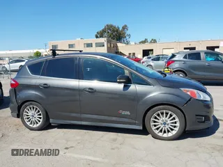 2016 Ford C-Max SEL z VIN 1FADP5CU1GL112085, wystawiony jako IAAI lot #42239257 z przebiegiem 88 149 mil mil oraz . Historia ofert i sprzedaży dostępna na DreamBid. Obrazek 14.