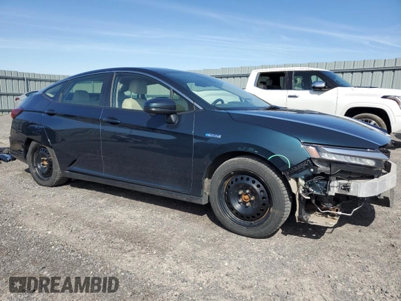 2018 Honda Clarity Touring z VIN JHMZC5F35JC800286, wystawiony jako Copart lot #55320545 z przebiegiem 122 548 mil mil oraz Czysty tytuł • Clean title. Historia ofert i sprzedaży dostępna na DreamBid. Obrazek 4.