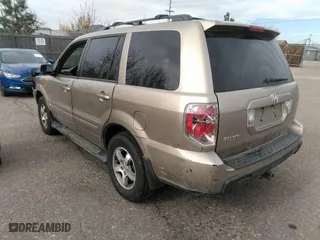 2006 Honda Pilot EX-L with VIN 2HKYF18556H523873, listed as a IAAI auction lot 41907028 with 226,072 mi miles. Bid and sale history available at carsss.com. Image 3.