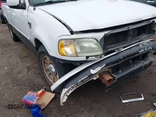 2003 Ford F-150 XL with VIN 1FTRX17W73NA42322, listed as a IAAI auction lot 41680100 with 129,295 mi miles. Bid and sale history available at carsss.com. Image 12.