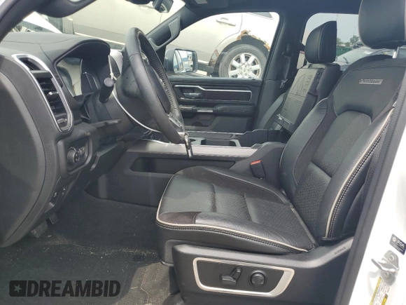 2023 Ram 1500 Laramie with VIN 1C6SRFJTXPN583434, listed as a Copart auction lot 61860925 with 28,064 mi miles and Clean title. Bid and sale history available at DreamBid. Image 7.