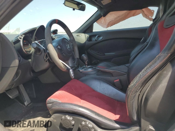 2015 Nissan 370Z Nismo z VIN JN1AZ4EH3FM441254, wystawiony jako Copart lot #52646145 z przebiegiem 74 303 mil mil oraz Szkoda całkowita • Salvage title. Historia ofert i sprzedaży dostępna na DreamBid. Obrazek 10.