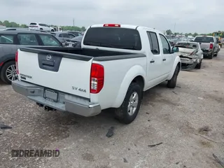 2013 Nissan Frontier SV with VIN 1N6AD0EV7DN721726, listed as a IAAI auction lot 42116254 with 219,106 mi miles and . Bid and sale history available at DreamBid. Image 4.