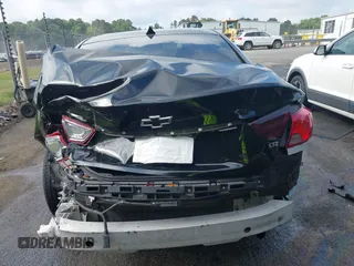 2014 Chevrolet Impala LTZ with VIN 2G1155S39E9102462, listed as a IAAI auction lot 42618513 with 121,943 mi miles and . Bid and sale history available at DreamBid. Image 16.