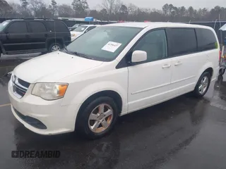2012 Dodge Grand Caravan SXT with VIN 2C4RDGCG4CR304472, listed as a IAAI auction lot 41396437 with 180,309 mi miles and . Bid and sale history available at DreamBid. Image 17.