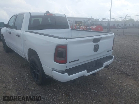 2023 Ram 1500 Laramie with VIN 1C6SRFJT3PN541901, listed as a IAAI auction lot 42156766 with 58,082 mi miles and . Bid and sale history available at DreamBid. Image 3.