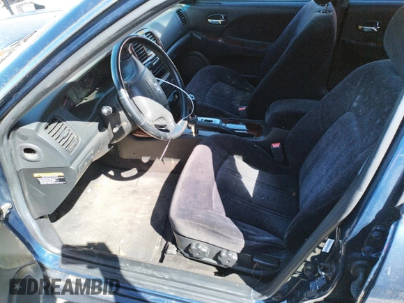 2002 Hyundai Sonata GLS with VIN KMHWF35H12A702457, listed as a Copart auction lot 60985574 with 99,698 mi miles and Salvage Title. Bid and sale history available at carsss.com. Image 7.