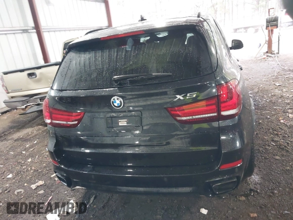 2016 BMW X5 xDrive50i with VIN 5UXKR6C55G0J80514, listed as a IAAI auction lot 41846930 with 95,817 mi miles. Bid and sale history available at carsss.com. Image 17.