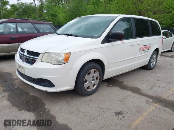 2013 Dodge Grand Caravan SE with VIN 2C4RDGBG8DR505844, listed as a IAAI auction lot 42139152 with 206,399 mi miles and . Bid and sale history available at DreamBid. Image 2.