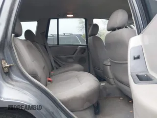 2003 Jeep Grand Cherokee Laredo with VIN 1J4GX48SX3C604904, listed as a IAAI auction lot 40884443 with 188,352 mi miles. Bid and sale history available at carsss.com. Image 8.