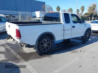 1997 Ford F-150 with VIN 1FTDX1723VKB04987, listed as a IAAI auction lot 41411405 with 234,750 mi miles and . Bid and sale history available at DreamBid. Image 4.