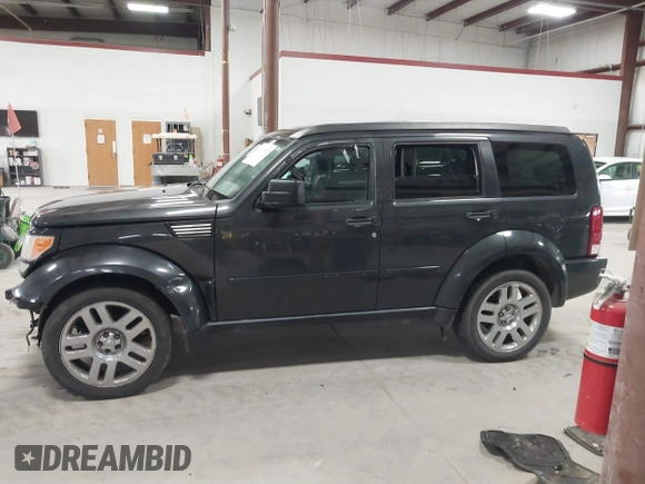 2010 Dodge Nitro Heat with VIN 1D4PT4GK4AW173980, listed as a IAAI auction lot 41842870 with 165,087 mi miles and . Bid and sale history available at DreamBid. Image 14.